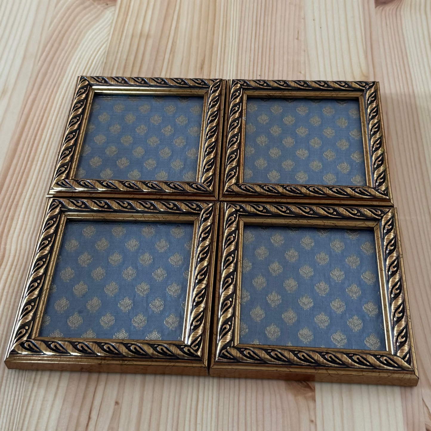 Ornate golden frame with greyish blue brocade fabric coaster set of 4